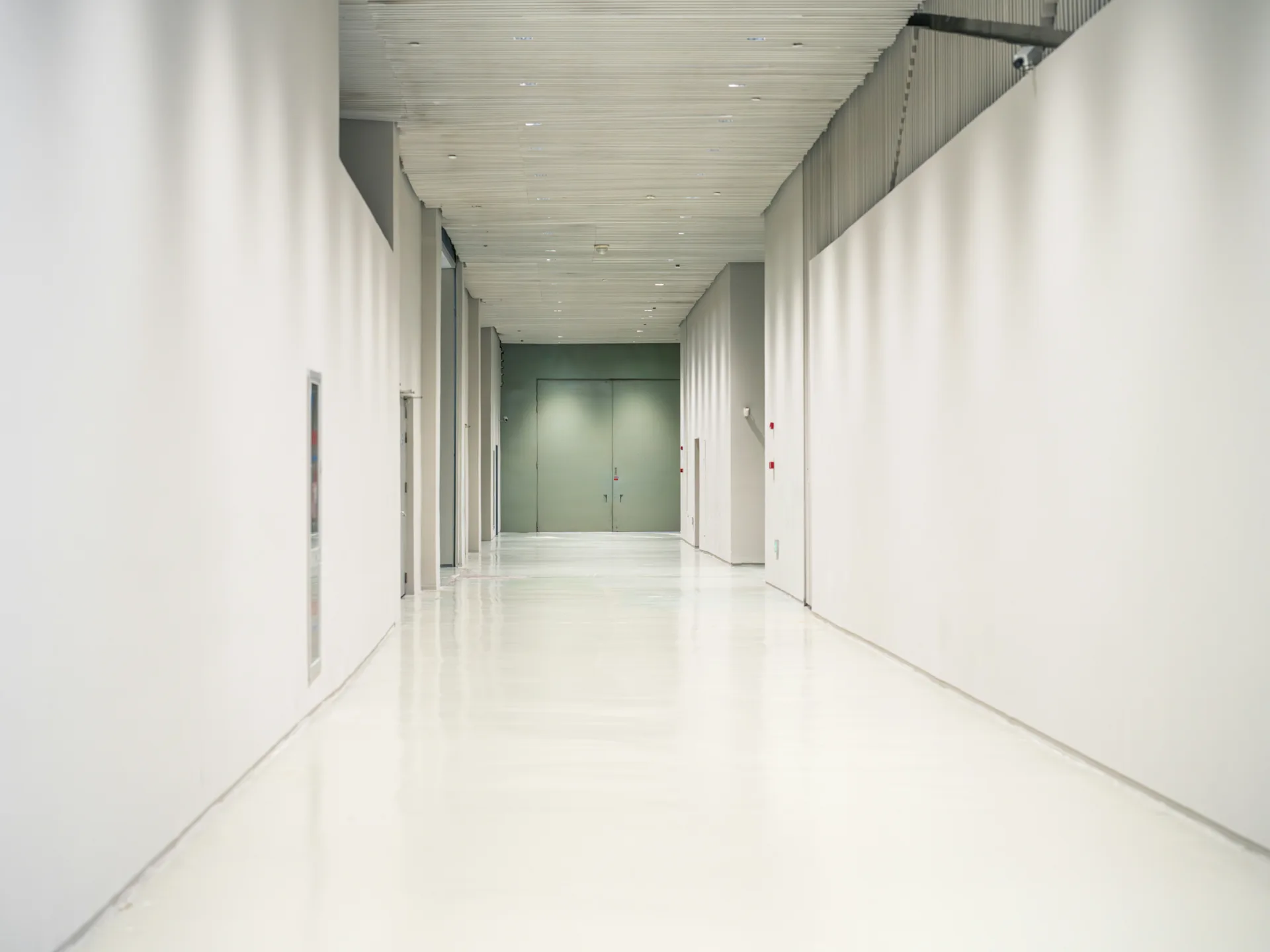 white epoxy commercial floor in a Detroit corridor