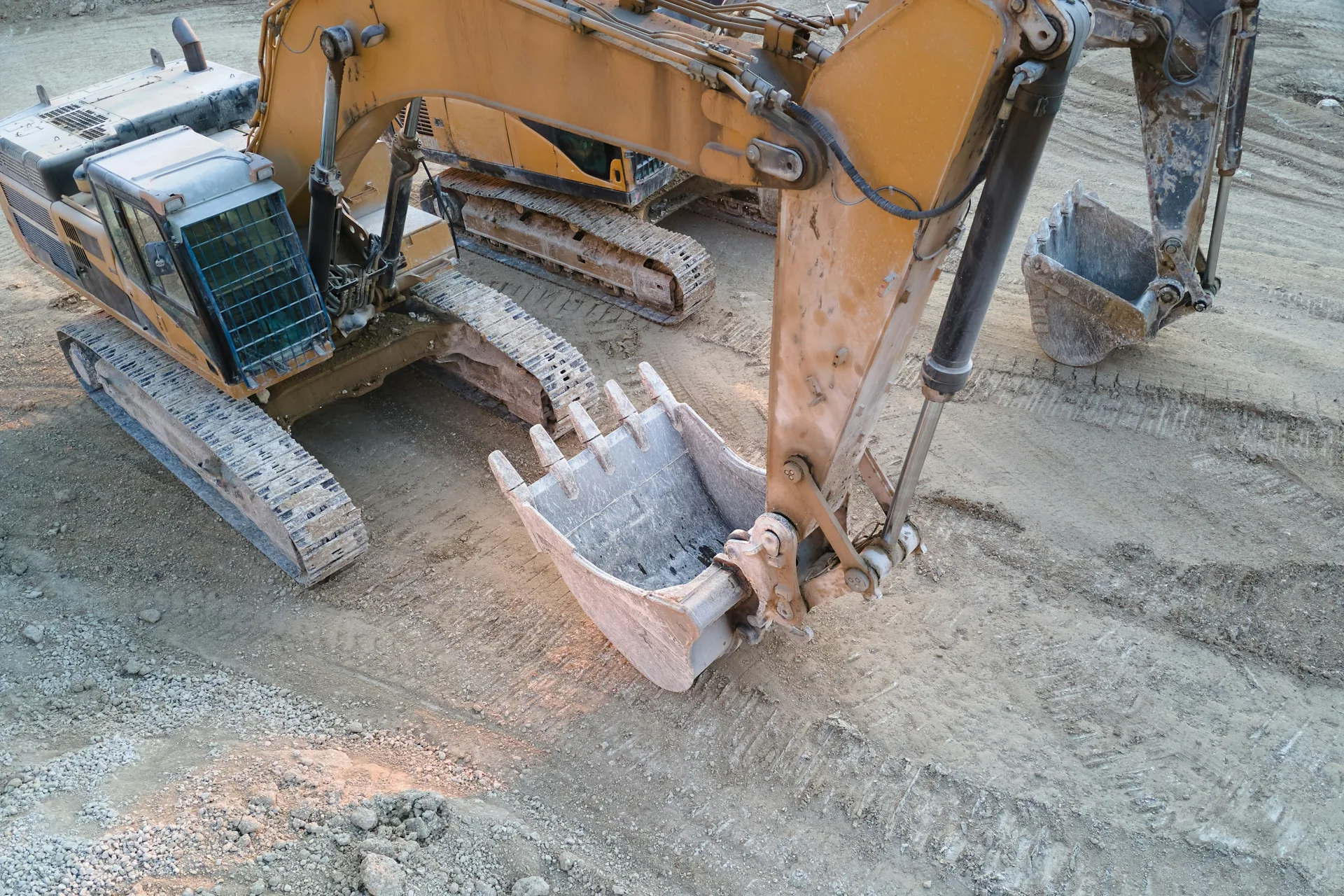 excavator working on a heavy-equipment concrete pad in Detroit