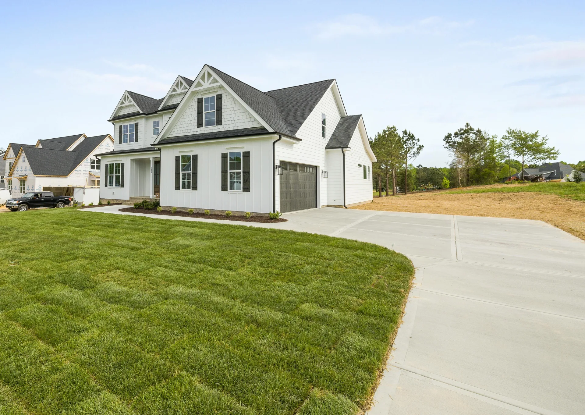 curving concrete driveway at an acreage home near Detroit