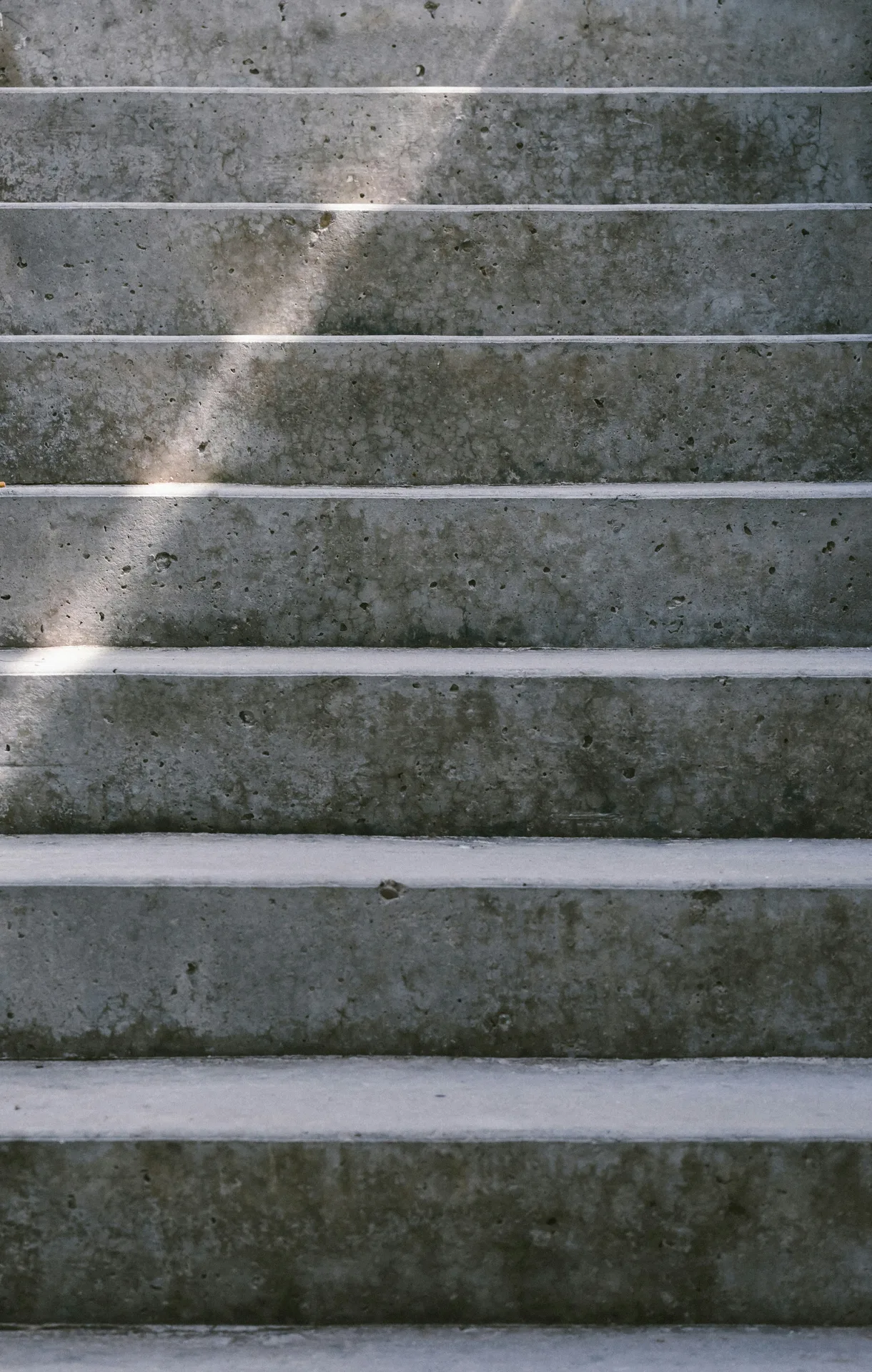 textured concrete entry steps at a Detroit home