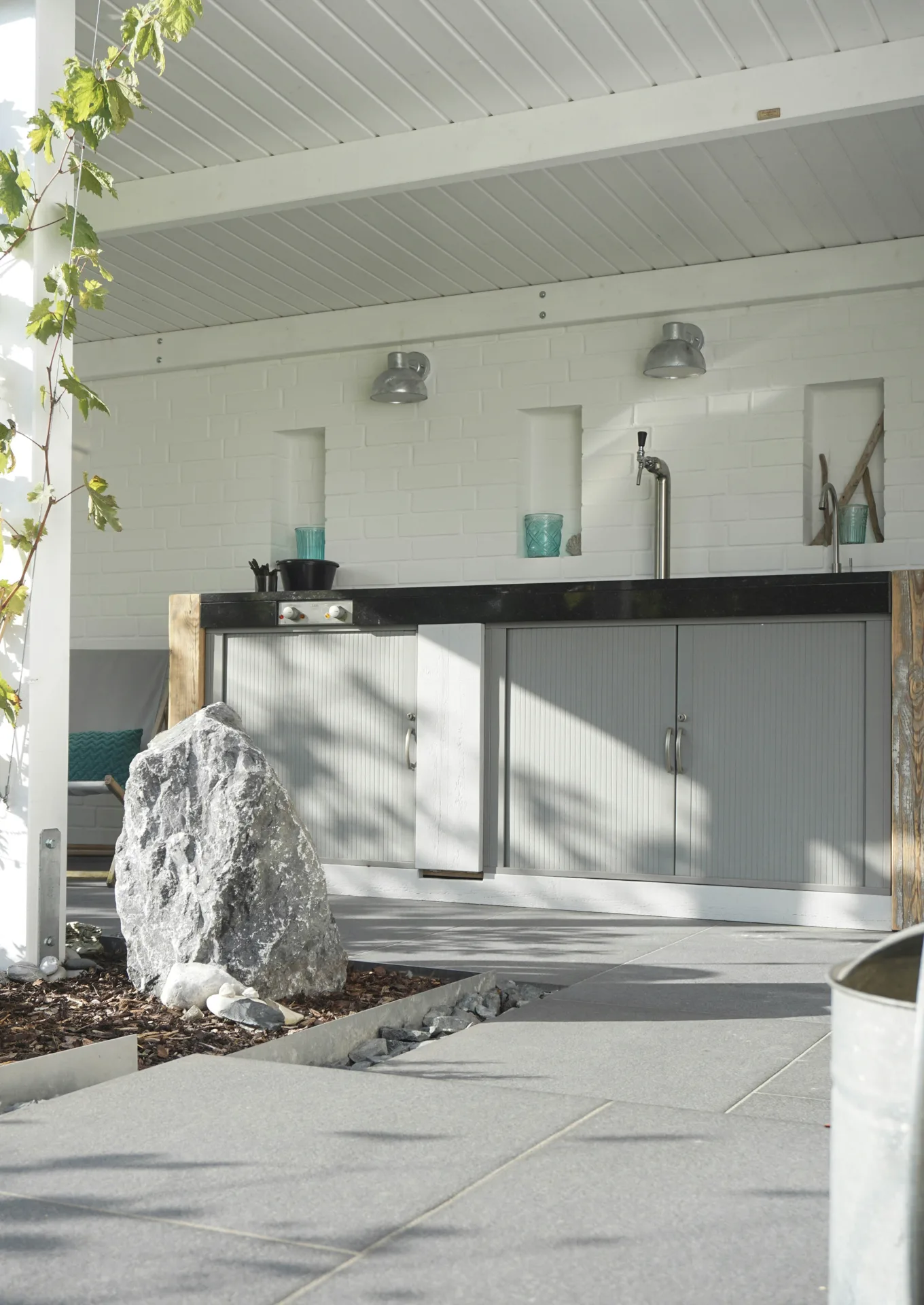polished concrete outdoor bar counter at a Detroit home